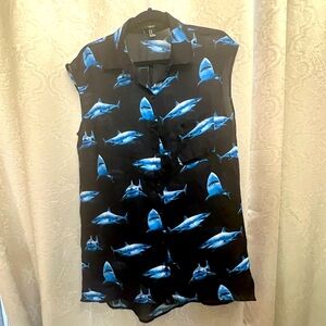 Sheer shark print high-low hem top. Button down front.